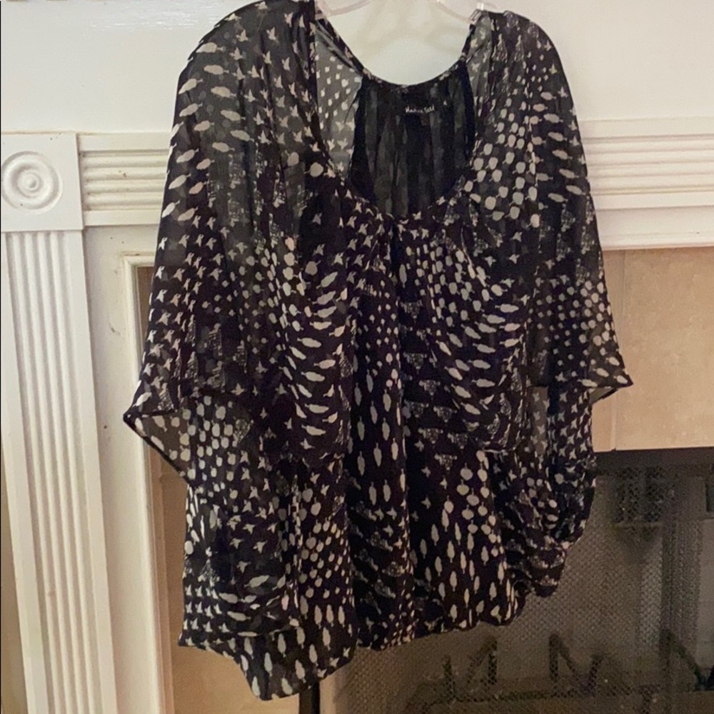 Black “flowy” sheer shirt with a white print